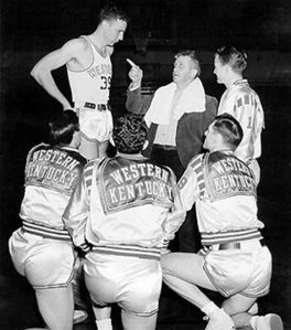 Renowned Western basketball coach Edgar Allen Diddle talks to Odie Spears, E.A. Diddle, Dee Gibson, Don Ray, John Oldham and Oran McKinney sometime between 1947 and 1948.